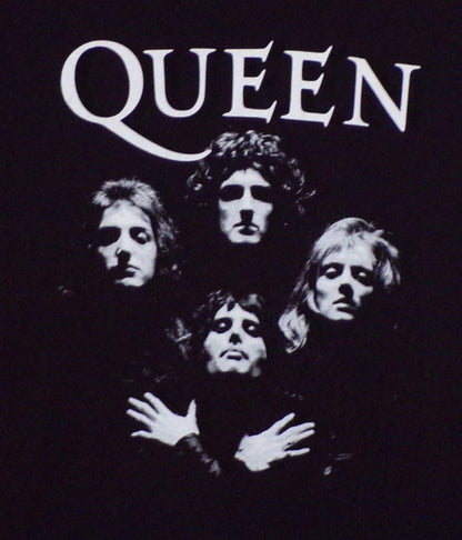 A unisex silkscreen t-shirt featuring bold artwork inspired by Queen's iconic "Bohemian Rhapsody" song. The design captures the vibrant energy of the classic anthem, perfect for rock fans. Available in sizes Small-2XL.







