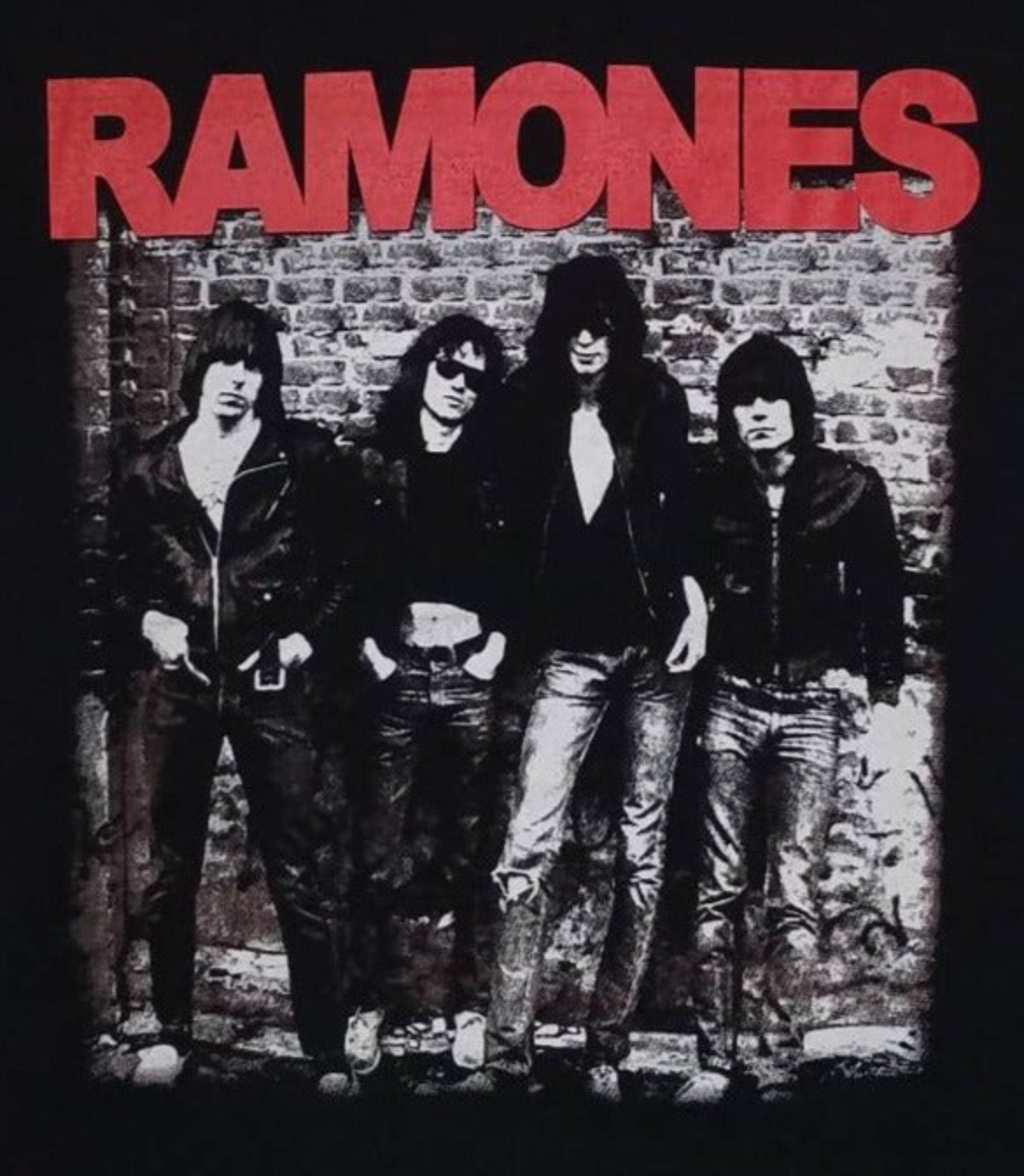 Front view of Ramones 1976 debut album band graphic T-shirt featuring classic black-and-white punk photo on black cotton tee