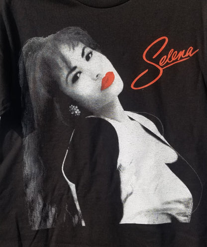 Front view of Selena Red Lips Portrait graphic T-shirt featuring black and white portrait with red lips detail printed in authentic silkscreen on black cotton tee