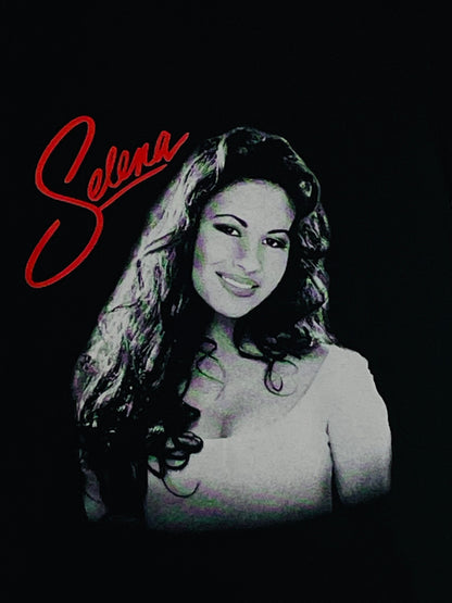 Youth T-shirt featuring the 'Selena Red Script' design, showcasing a bold red script in tribute to Selena. Available in XS-XL.
