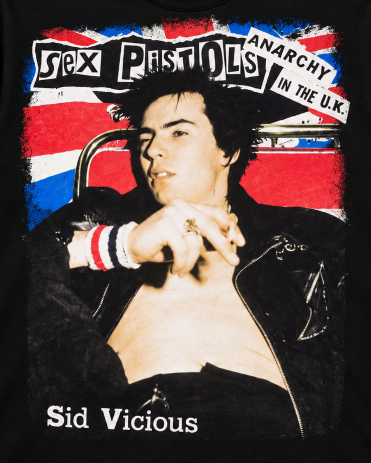 Close-up of the Sex Pistols Anarchy in the U.K. shirt design featuring Sid Vicious, distressed Union Jack imagery, and bold punk graphics.