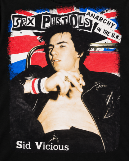 Close-up of the Sex Pistols Anarchy in the U.K. shirt design featuring Sid Vicious, distressed Union Jack imagery, and bold punk graphics.