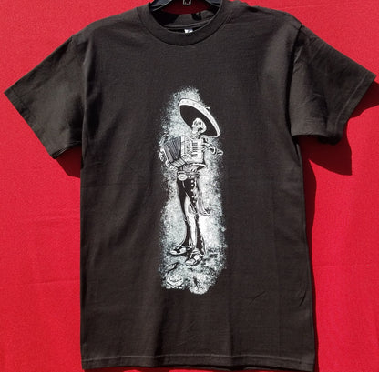 Skeleton Mariachi Accordion Player T-Shirt – A detailed graphic of a skeleton dressed in traditional mariachi attire, passionately playing an accordion. Bold and eye-catching design on a high-quality cotton tee. Available in sizes Small-2XL.