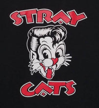 Load image into Gallery viewer, A bold, retro-inspired graphic of the Stray Cats&#39; iconic &quot;Cat Head&quot; logo, capturing the vibrant energy and rockabilly spirit of the band in sharp, eye-catching detail.








