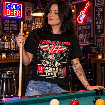 Woman wearing the Van Halen 1980 World Invasion Tour black T-shirt while playing pool in a rock bar—a standout shirt for longtime Van Halen fans.