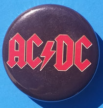 Load image into Gallery viewer, new rock band button set of 4 fashion buttons are 1.25 inches in size Set Includes ACDC Red Letter Logo On Black Anti Flag Red Star Sex Pistols The Adicts Logo In Triangle tv music collection buttons hard rock
