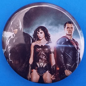 new dc comic button set of 4 fashion buttons are 1.25 inches in size Set Includes Batman Robin Swinging Catwoman With Finger In Mouth Batman Wonder Woman Superman Flash movies comics collection cartoon pinback