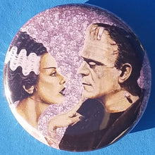 Load image into Gallery viewer, new bride of frankenstein button set of 7 fashion buttons are 1.25 inches in size Set Includes Bride of Frankenstein Bout To Kiss Bride of Frankenstein Couple In Heart Bride of Frankenstein Couple Sharing A Drink Bride of Frankenstein Front View Bride of Frankenstein Hands Over Breast Bride of Frankenstein Side View Frankenstein With Wrench tv movie horror
