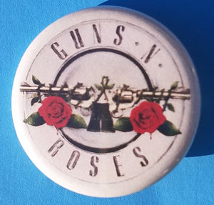 new guns n roses button set of 5 fashion buttons are 1.25 inches in size Set Includes Guns N Roses Appetite For Destruction Guns N Roses Double Gun On Black Guns N Roses Double Gun On White Guns N Roses Slash Skull With Double Gun Guns N Roses Yellow Logo On Black hard rock music pinback