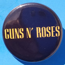 Load image into Gallery viewer, new guns n roses button set of 5 fashion buttons are 1.25 inches in size Set Includes Guns N Roses Appetite For Destruction Guns N Roses Double Gun On Black Guns N Roses Double Gun On White Guns N Roses Slash Skull With Double Gun Guns N Roses Yellow Logo On Black hard rock music pinback
