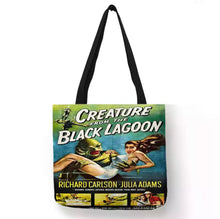 Load image into Gallery viewer, new creature from the black lagoon movie cover canvas tote bags image is printed on both sides apparel movies unisex vintage hollywood horror handbags
