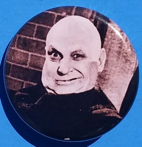 new the addams family button set of 7 fashion buttons are 1.25 inches in size Set Includes Group Picture The Addams Family Logo Morticia Gomez Morticia In A Chair Morticia Up close Uncle Fester Wednesday vintage hollywood movie collection tv pinback